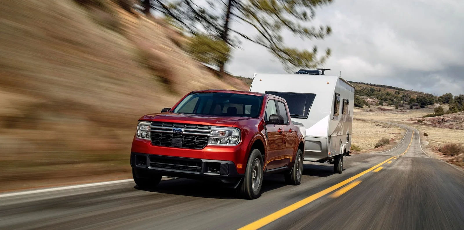 Red 2024 Ford Maverick Pickup Truck Towing A Trailer