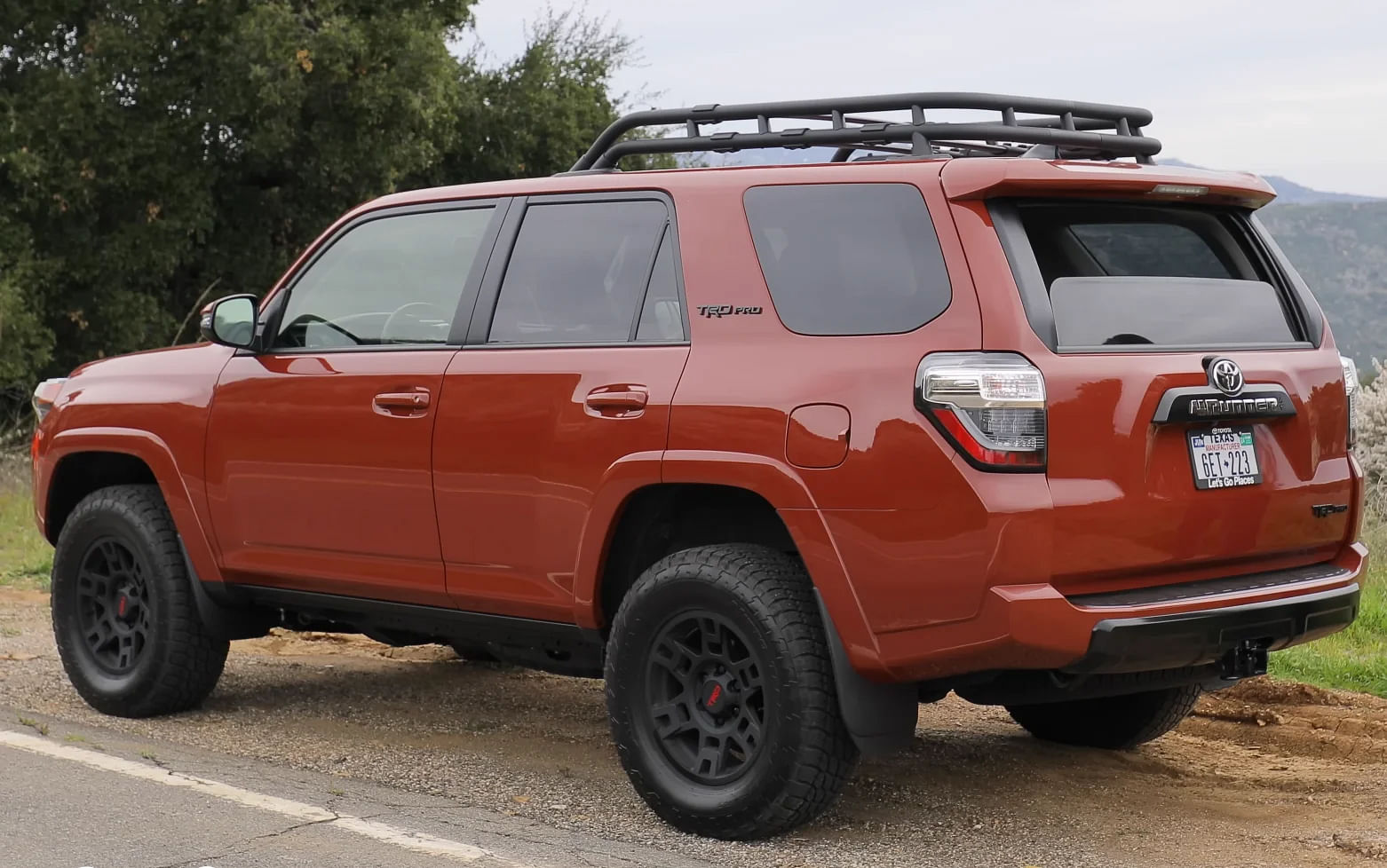 Orange Toyota 4 Runner SUV Side Profile