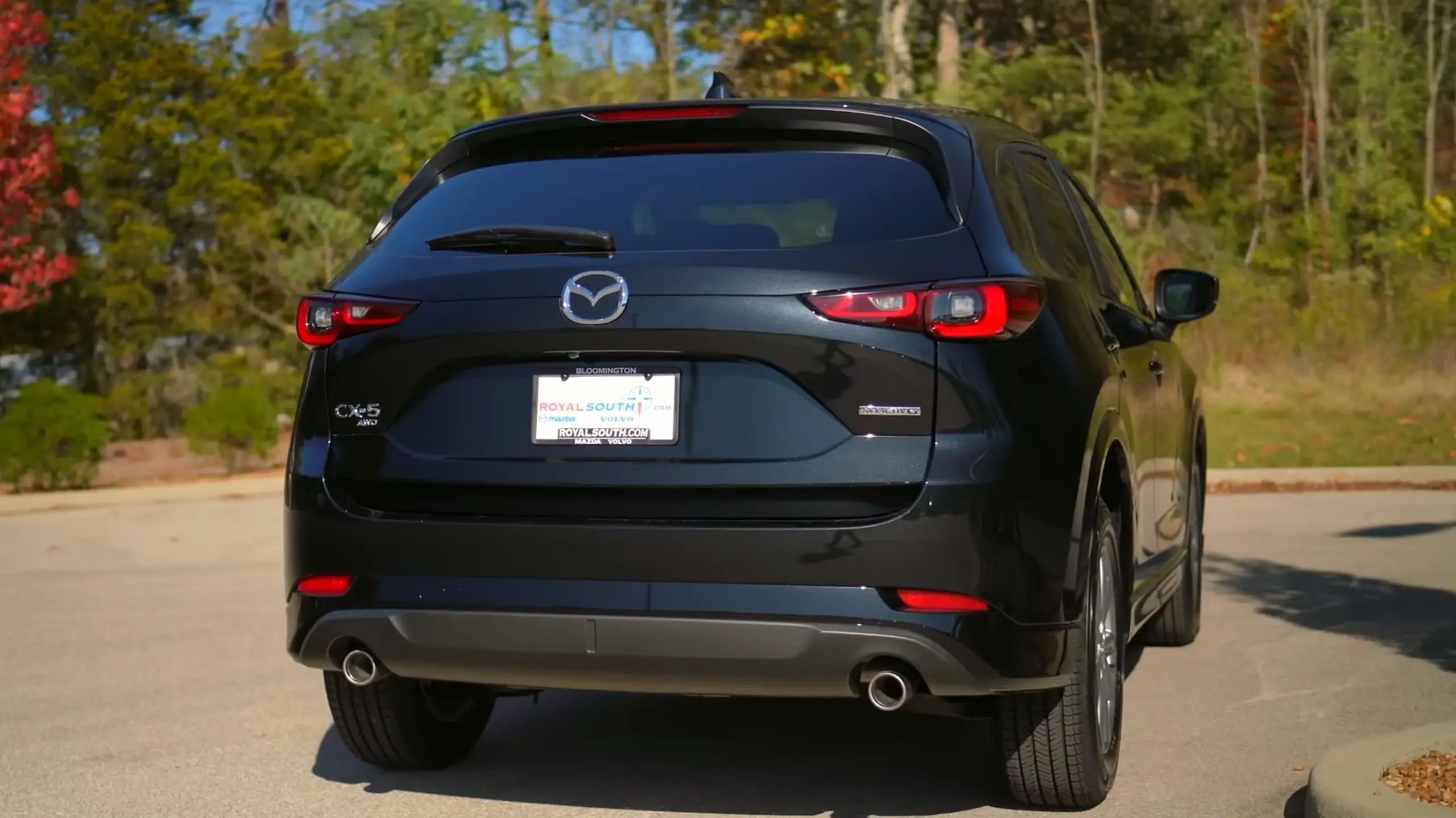 black 2024 Mazda CX-5 rear view