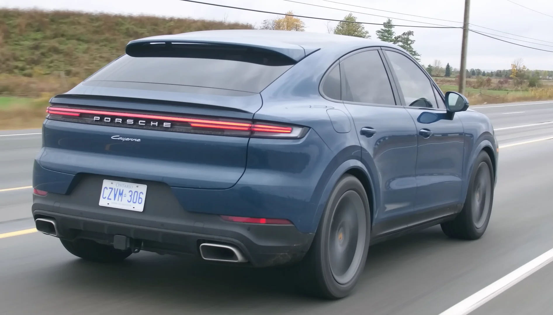  Blue 2024 Porsche Cayenne Rear Side Profile