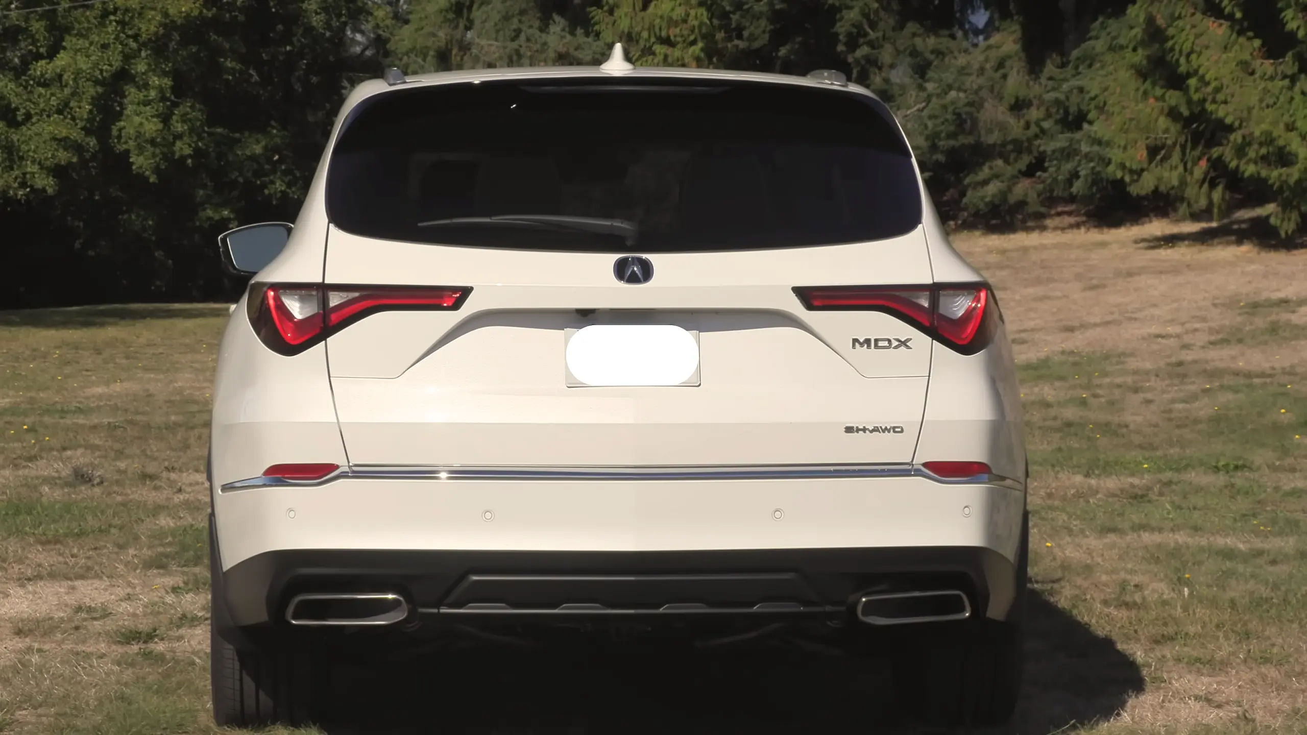 White 2024 Acura MDX rear view