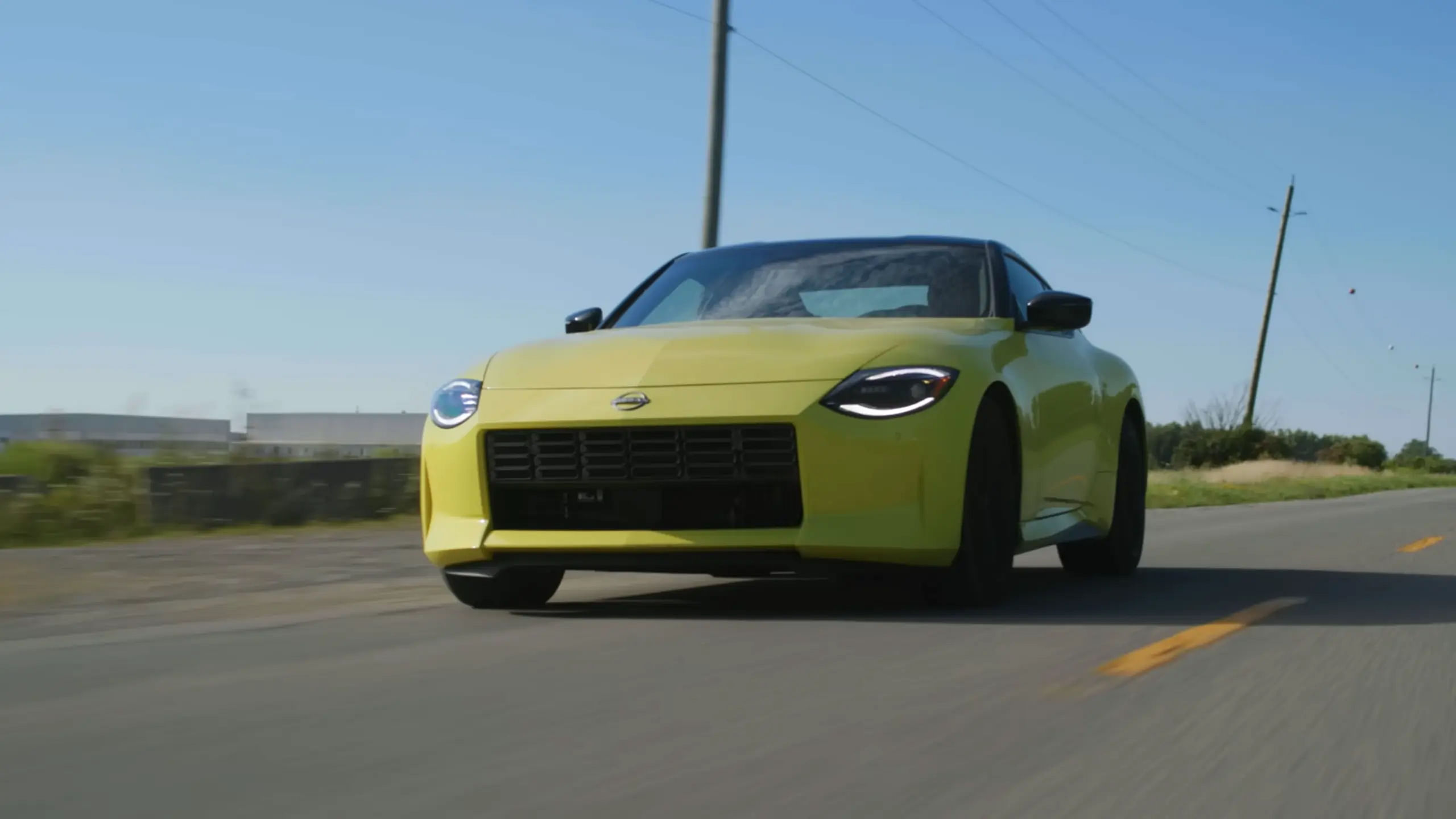 front view of 2024 Nissan Z driving on the road