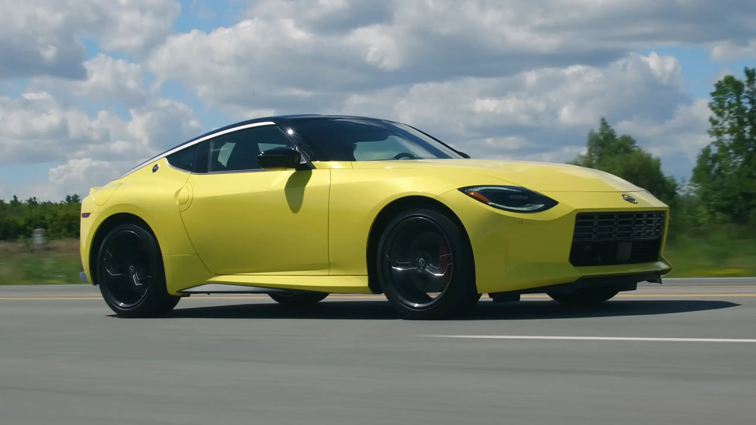 Yellow 2024 Nissan Z side view